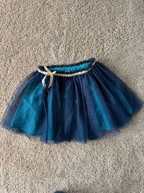 Mini Boden turquoise and navy tulle skirt with gold trim | 6-7Y